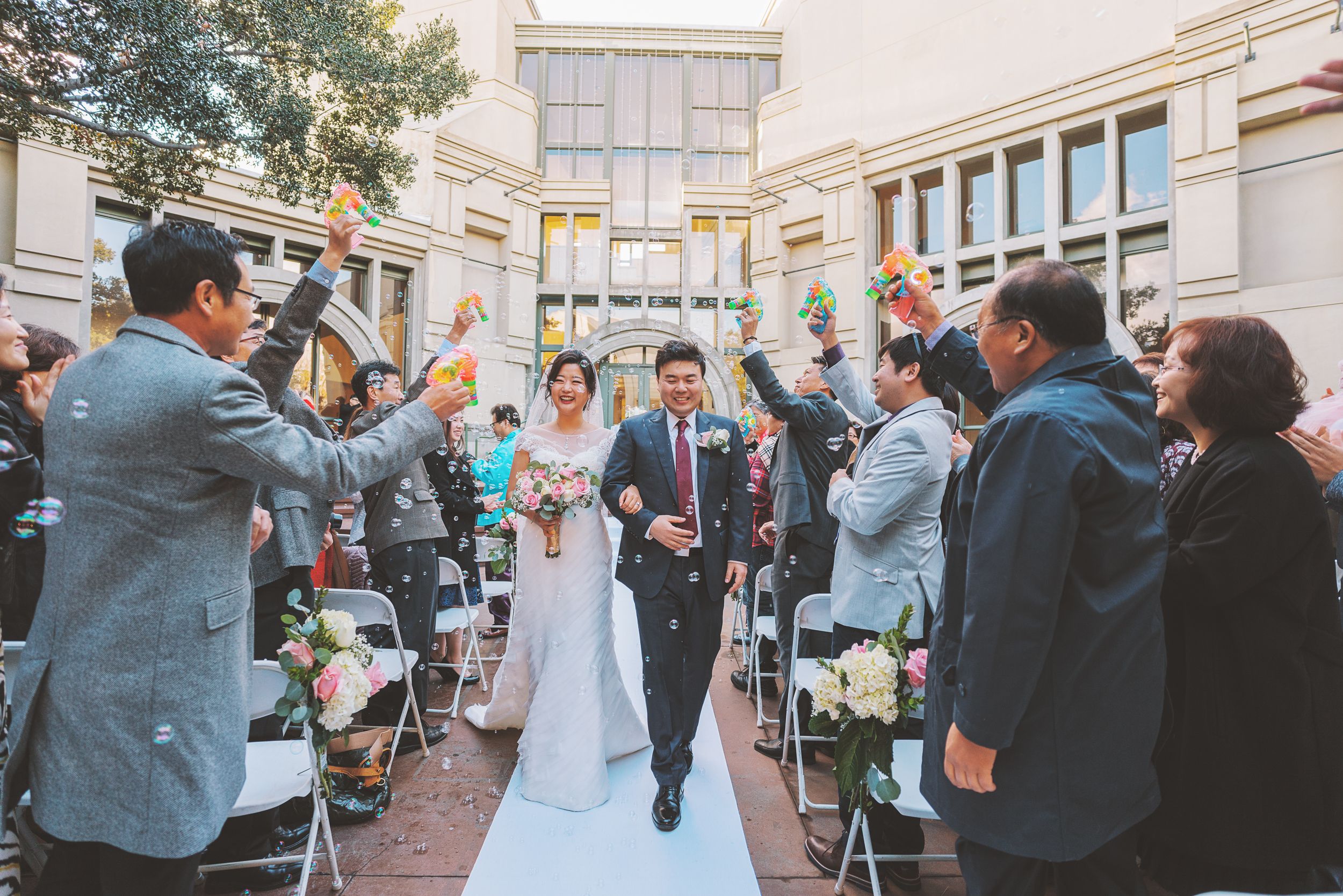 Couple walks down the Aisle after saying "I Do!"
